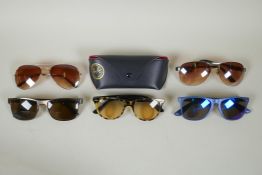 A pair of Ray Ban Wayfarer II sunglasses, RB2185 1248/AC tortoiseshell, and four other pairs of