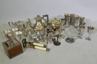 A quantity of silver plated ware, a biscuit barrel and cut glass claret jug