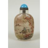 A Chinese reverse decorated glass snuff bottle depicting boys and water buffalo, 9cm high