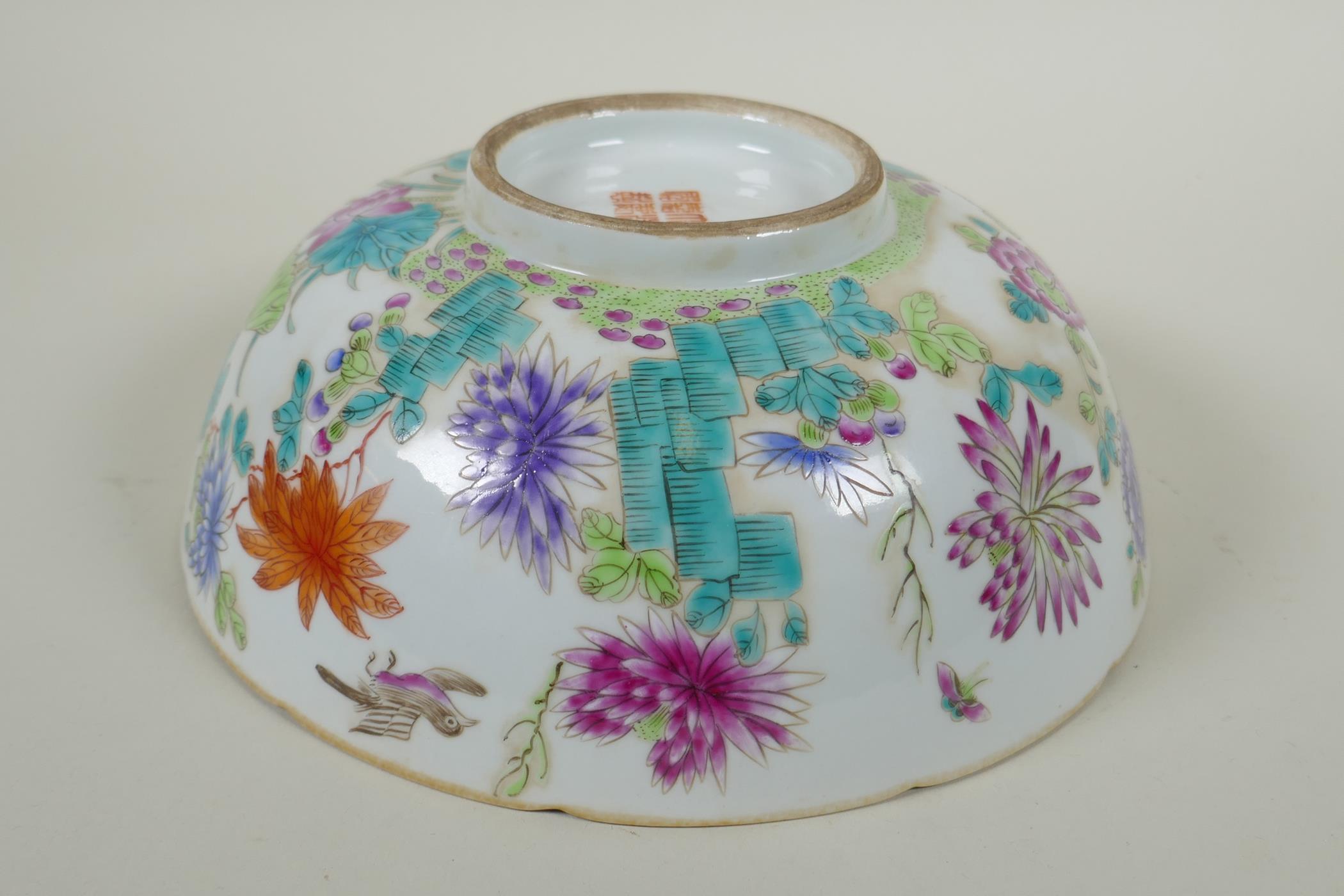 A C19th Chinese famille rose porcelain bowl with lobed rim, decorated with birds amongst asiatic - Image 3 of 7