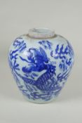 A Chinese C19th blue and white porcelain ginger jar decorated with a dragon chasing the flaming