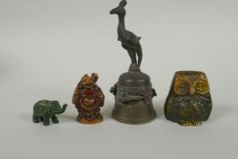 An antique Oriental bronze bell, a small bronze jolly Buddha and two bronze animals, largest 12cm