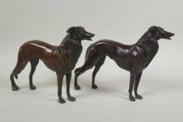 A pair of bronzed metal greyhounds, 22cm long