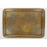 An antique Persian bronze tray with engraved decoration depicting the Kasra Arch and a king