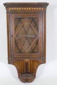 A small Victorian inlaid rosewood hanging corner display cabinet