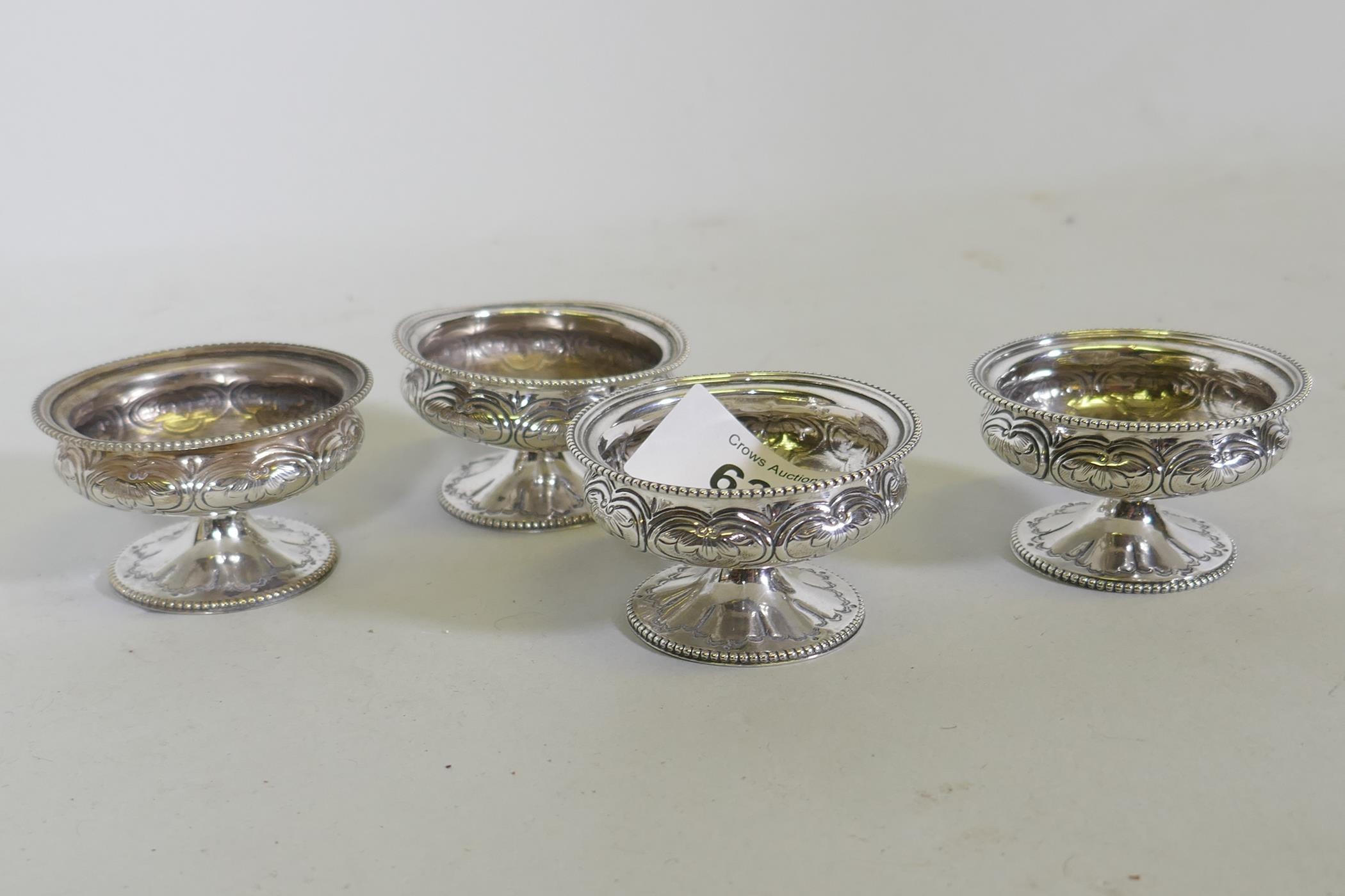 A set of four Victorian hallmarked silver salts, London 1868, W.H. maker, 148g total