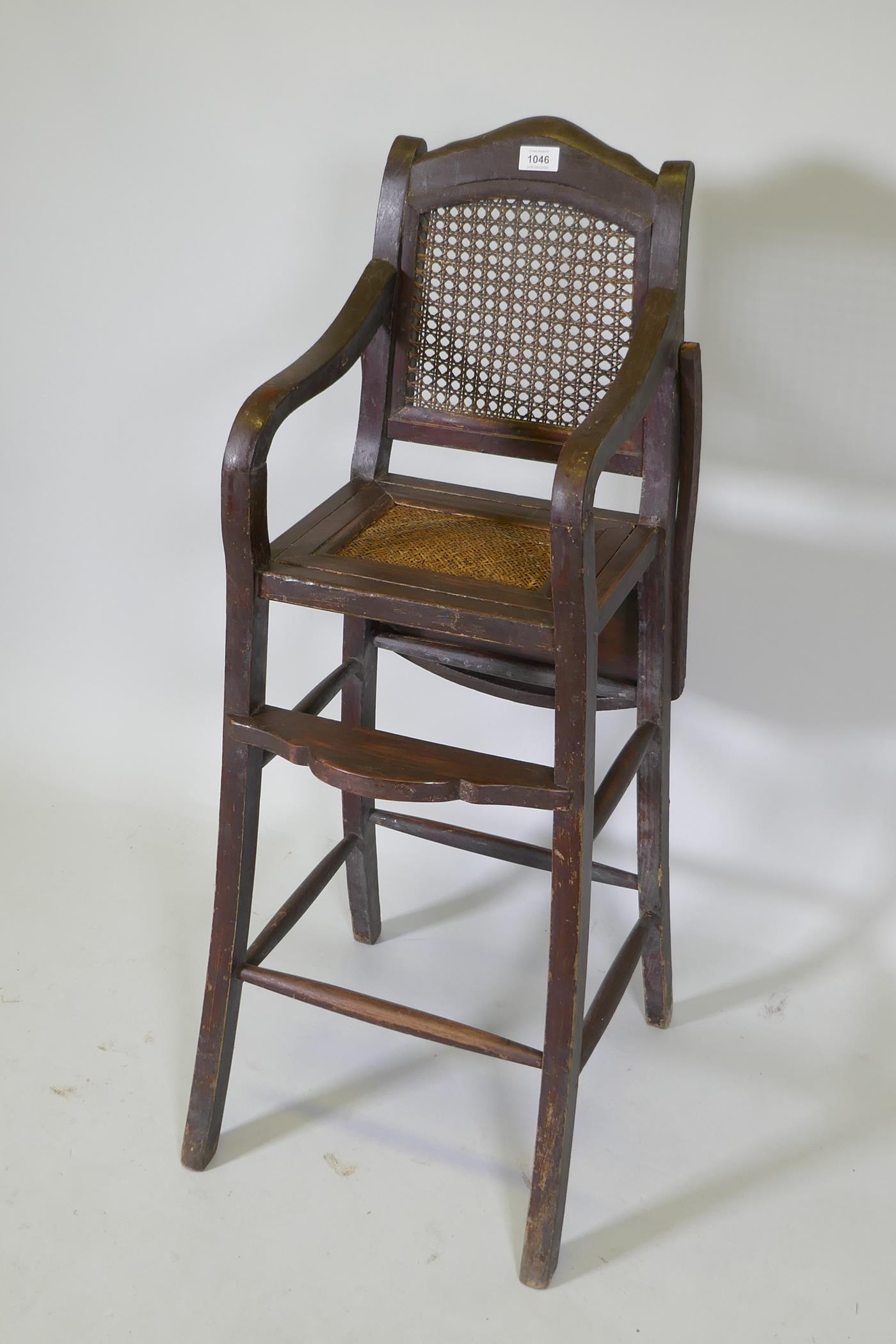 An oriental hardwood child's highchair with can back and seat, 103cm high - Image 4 of 4