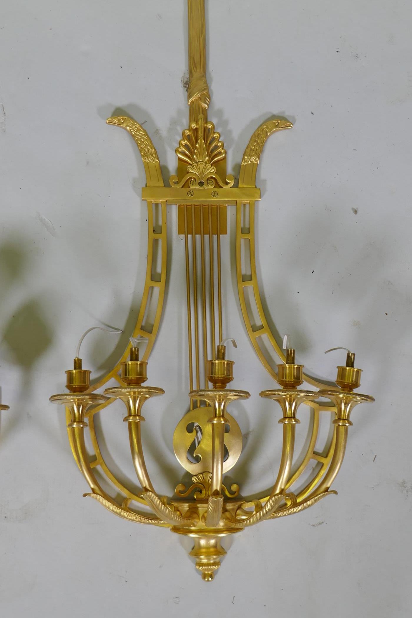 A pair of ormolu empire style five branch wall sconces of lyre form, 97cm high - Image 3 of 4