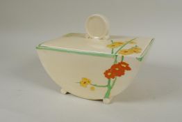An Art Deco Wilkinson Royal Staffordshire Clarice Cliff tureen, decorated with flowers, 20 x 13cm,