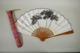 A Chinese bamboo fan with watercolour decoration of gourds, character inscription to the reverse,