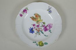 An C18th Meissen porcelain cabinet plate decorated with polychrome flowers and basket weave edge,