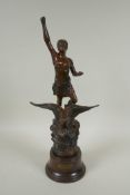 A spelter figure of a lady on the back of an eagle titled Night, on a Bakelite socle, 44cm high