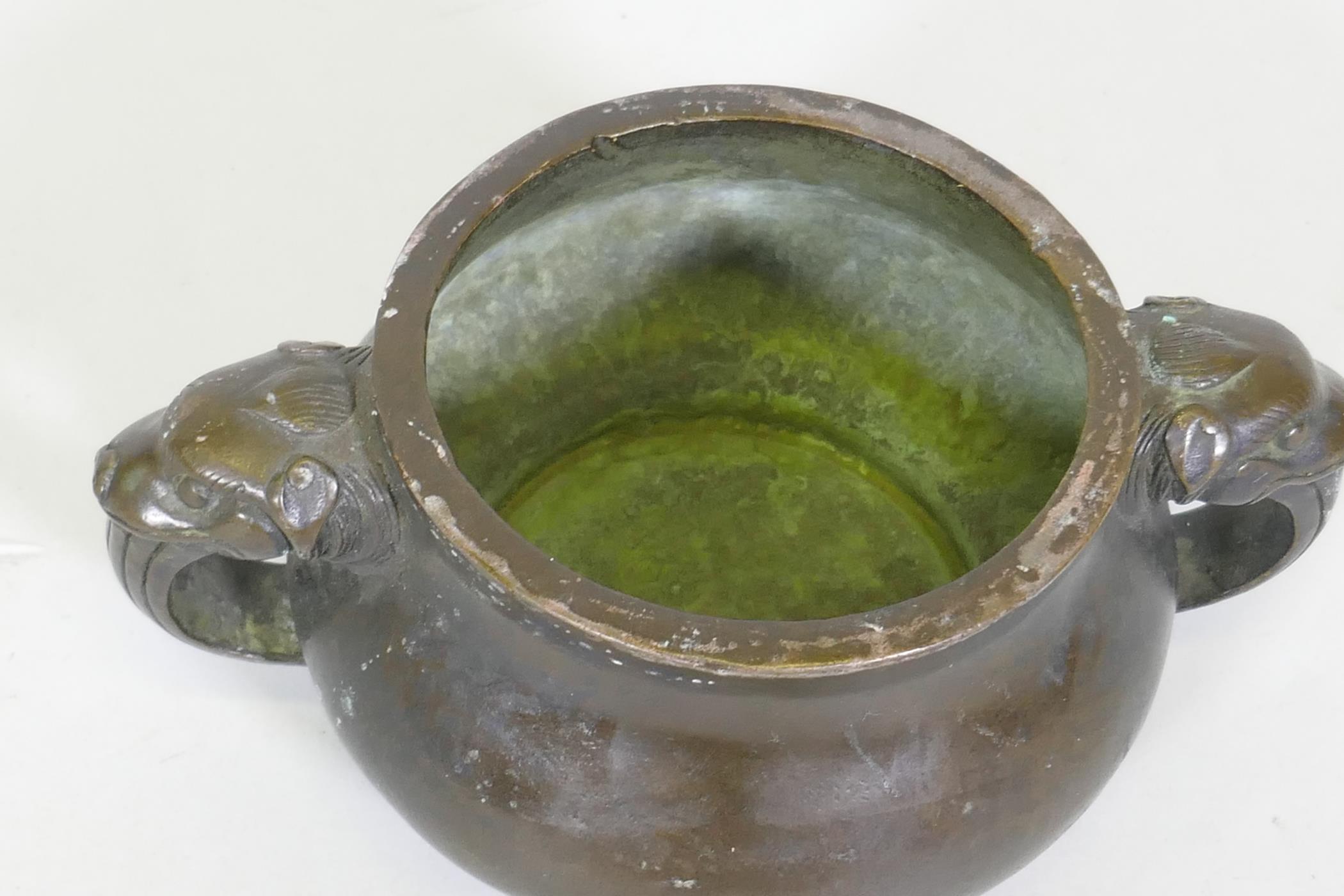 A Chinese bronze censer with dragon mask handles, seal mark to base, 19cm diameter - Image 2 of 5