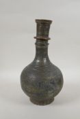 An antique Islamic patinated copper hookah base, 32cm high
