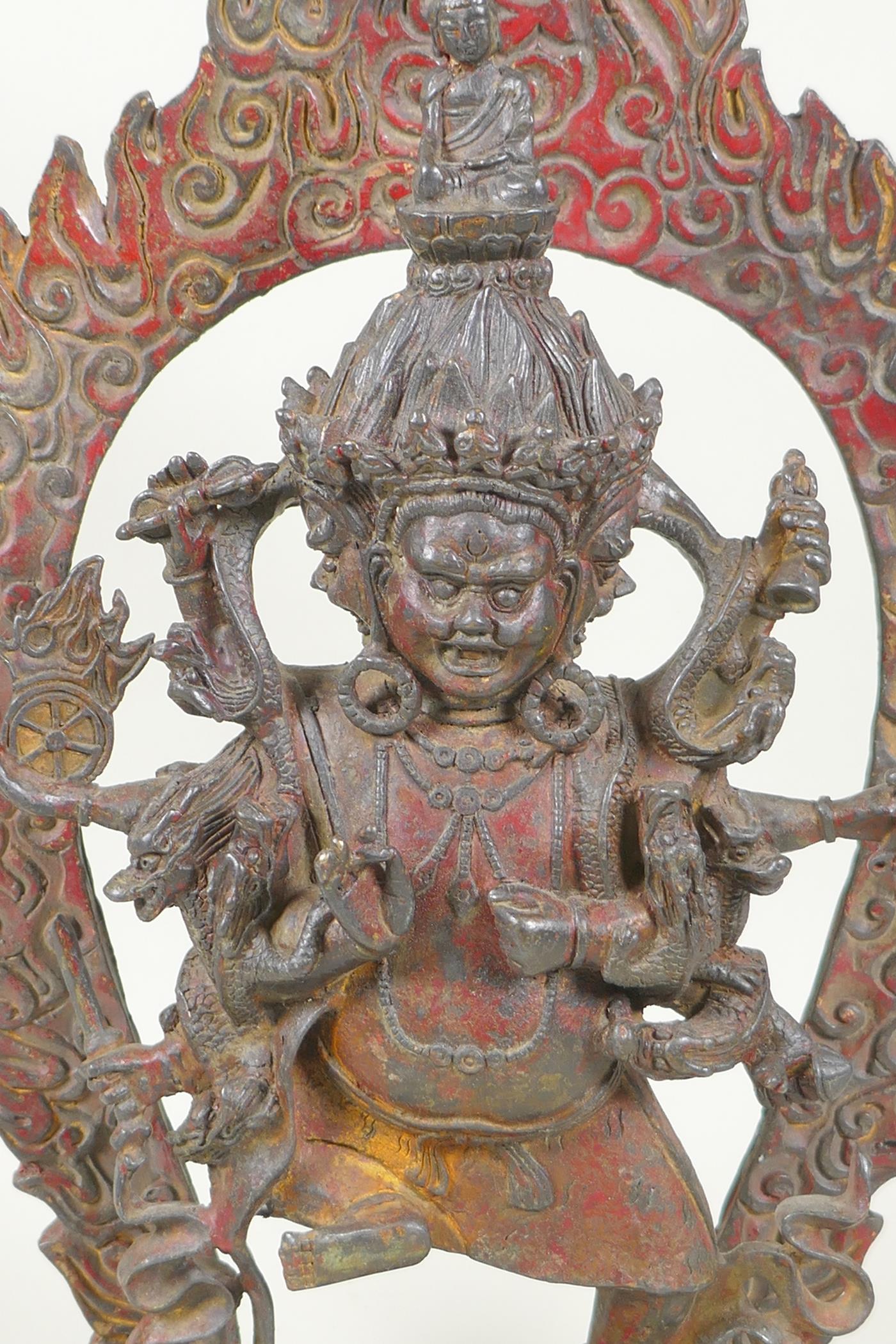 A Tibetan bronze figure of Mahakala, with remnants of gilt patina, 33cm high, double vajra mark to - Image 2 of 5