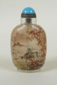 A Chinese reverse decorated glass snuff bottle depicting boys and water buffalo, 9cm high