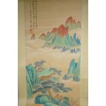 A Chinese watercolour scroll depicting a figure in an extensive mountainous landscape, 49 x 98cm