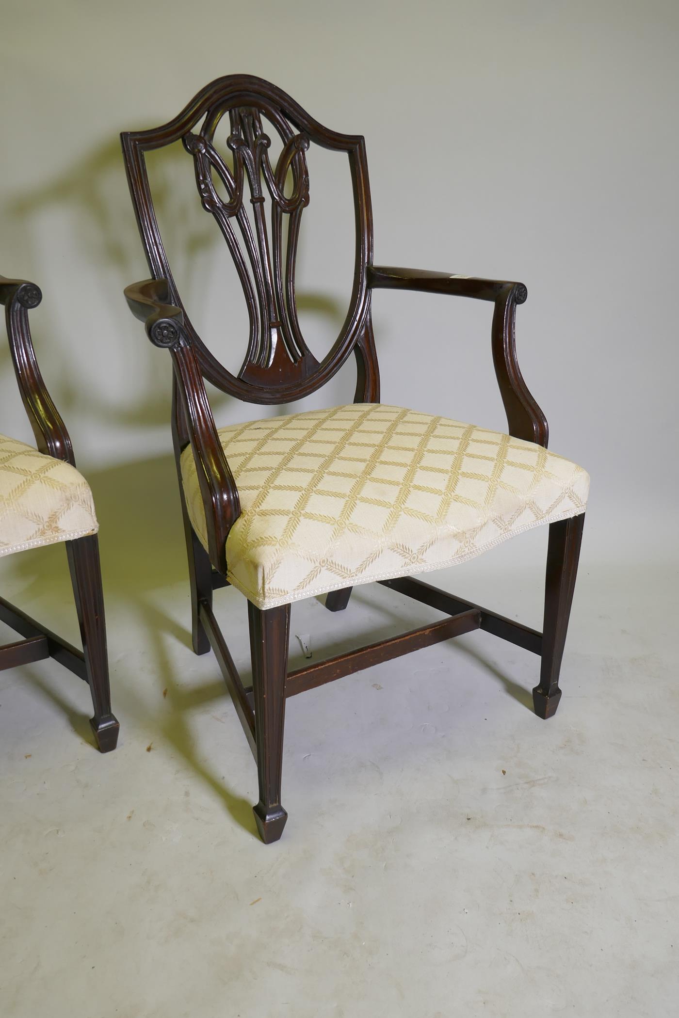 A pair of Hepplewhite style shield back mahogany elbow chairs, late C19th/early C20th - Image 2 of 3