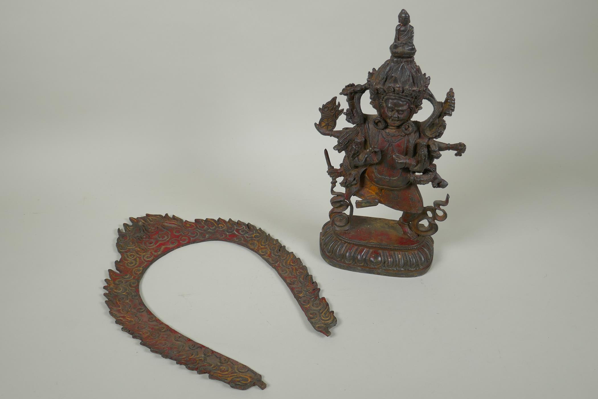 A Tibetan bronze figure of Mahakala, with remnants of gilt patina, 33cm high, double vajra mark to - Image 4 of 5