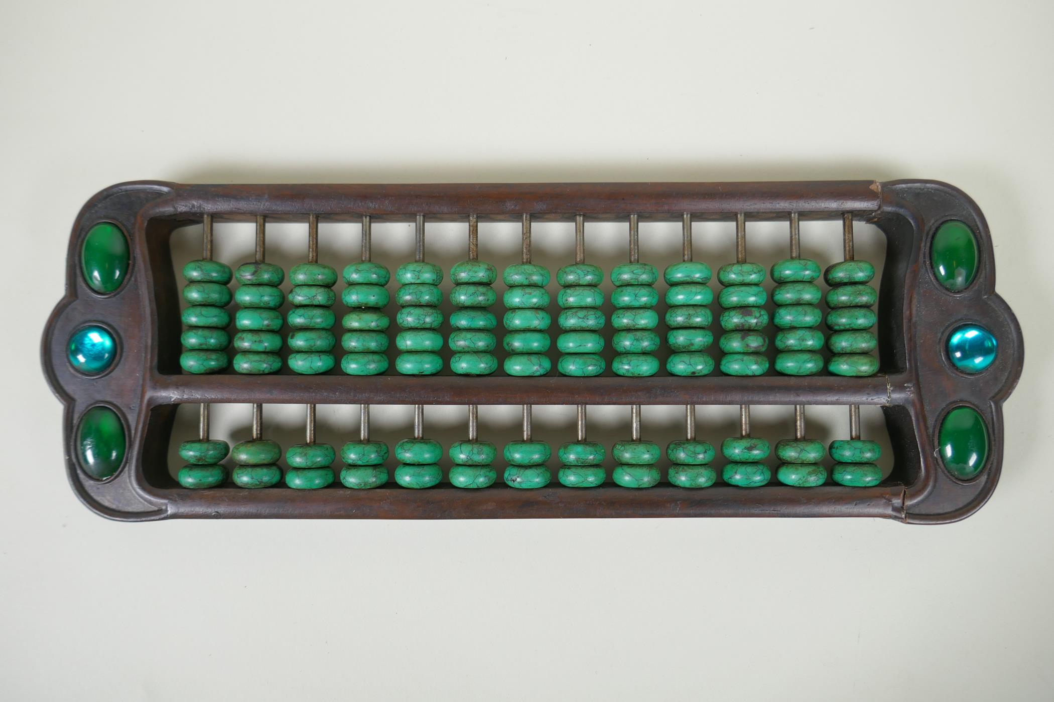 A Chinese hardwood abacus with turquoise beads, 41 x 14cm