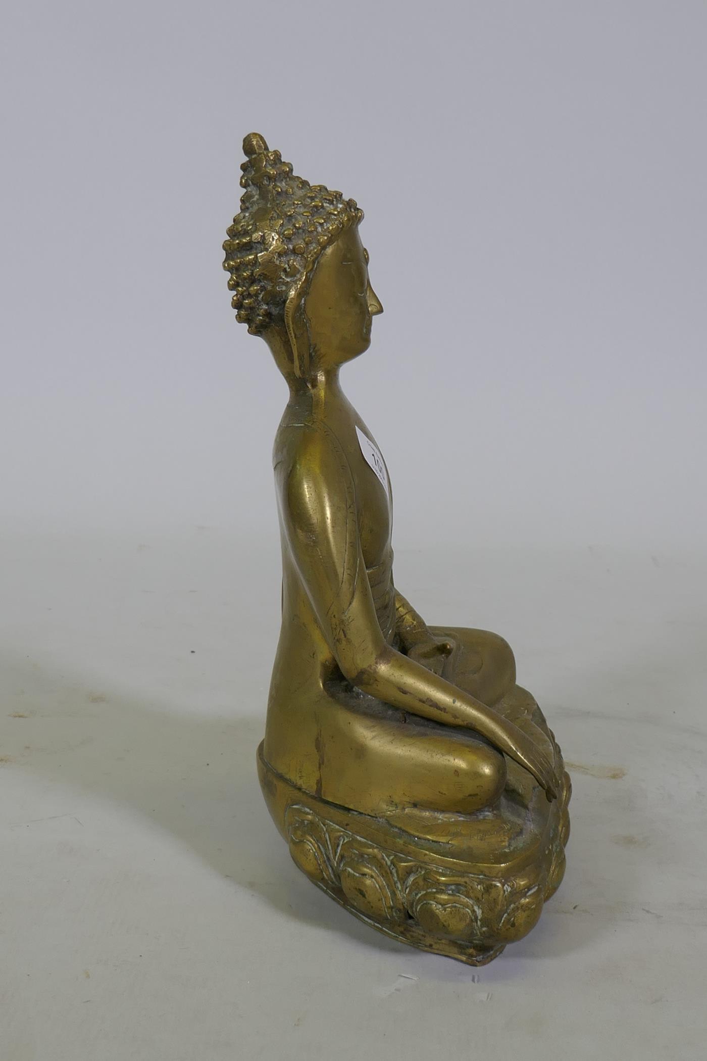 A brass figure of Buddha seated upon a lotus dias, 34cm high - Image 2 of 6