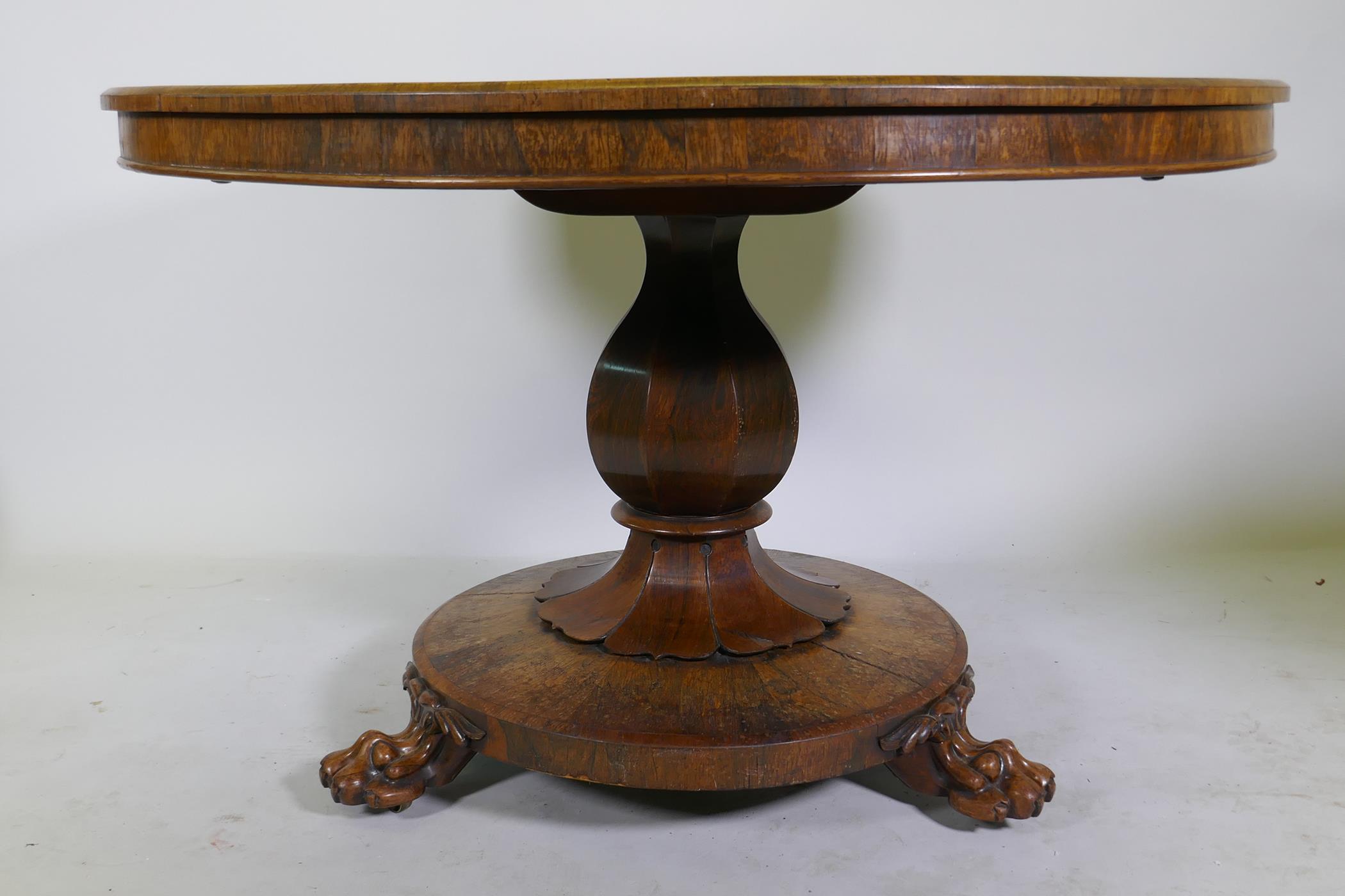 A C19th rosewood tilt top breakfast table, raised on a shaped column with carved detail and platform - Image 3 of 7
