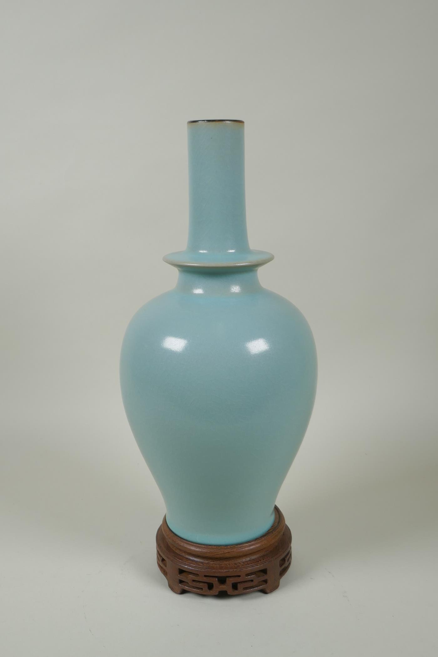 A Chinese Ru ware style porcelain vase, on a carved wood stand, 33cm high - Image 2 of 4