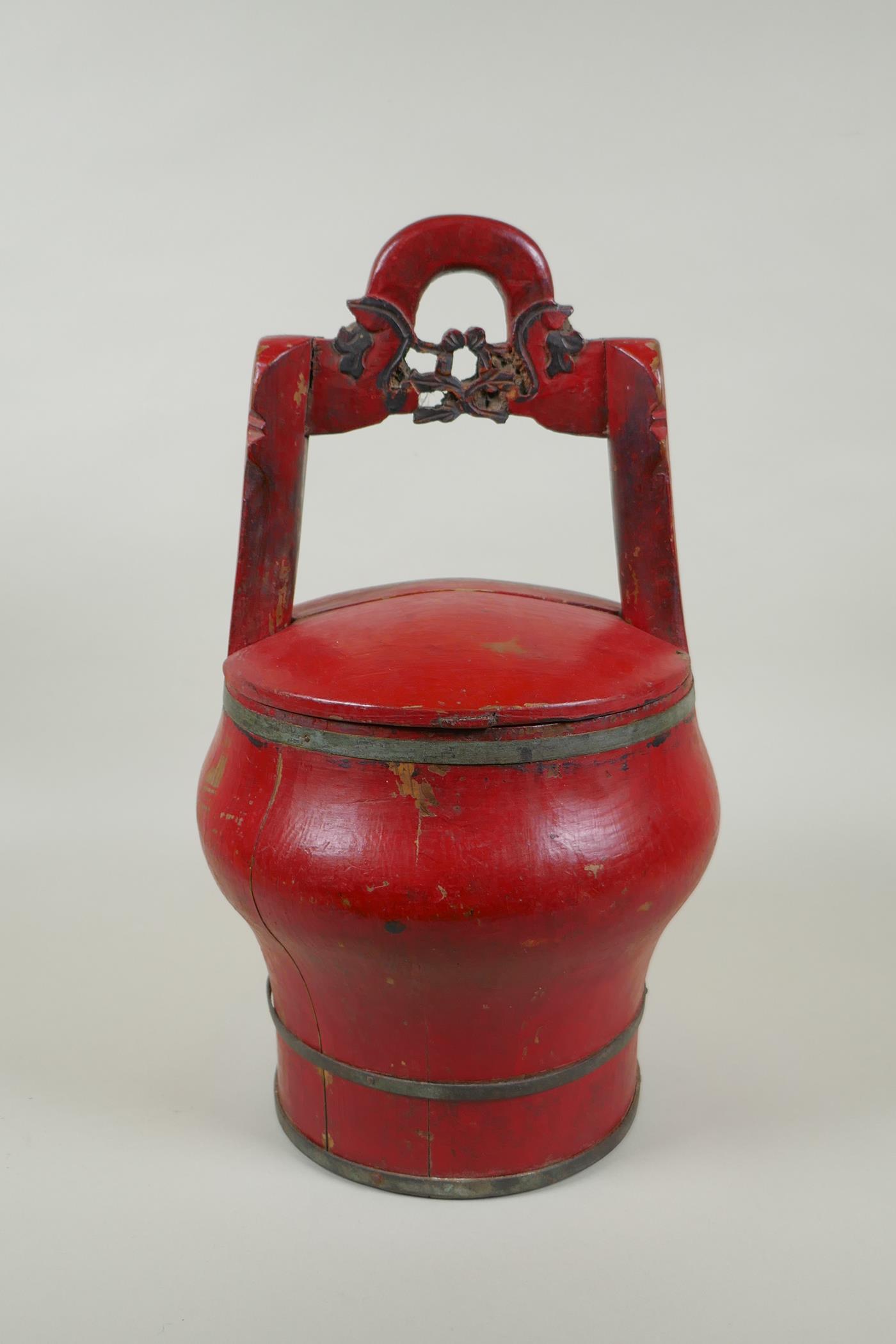 A Chinese red lacquered wood food carrier, 36cm high - Image 3 of 4