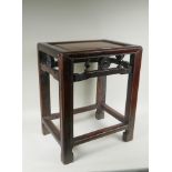 An antique Chinese hardwood lamp table, 40 x 30cm, 49cm high