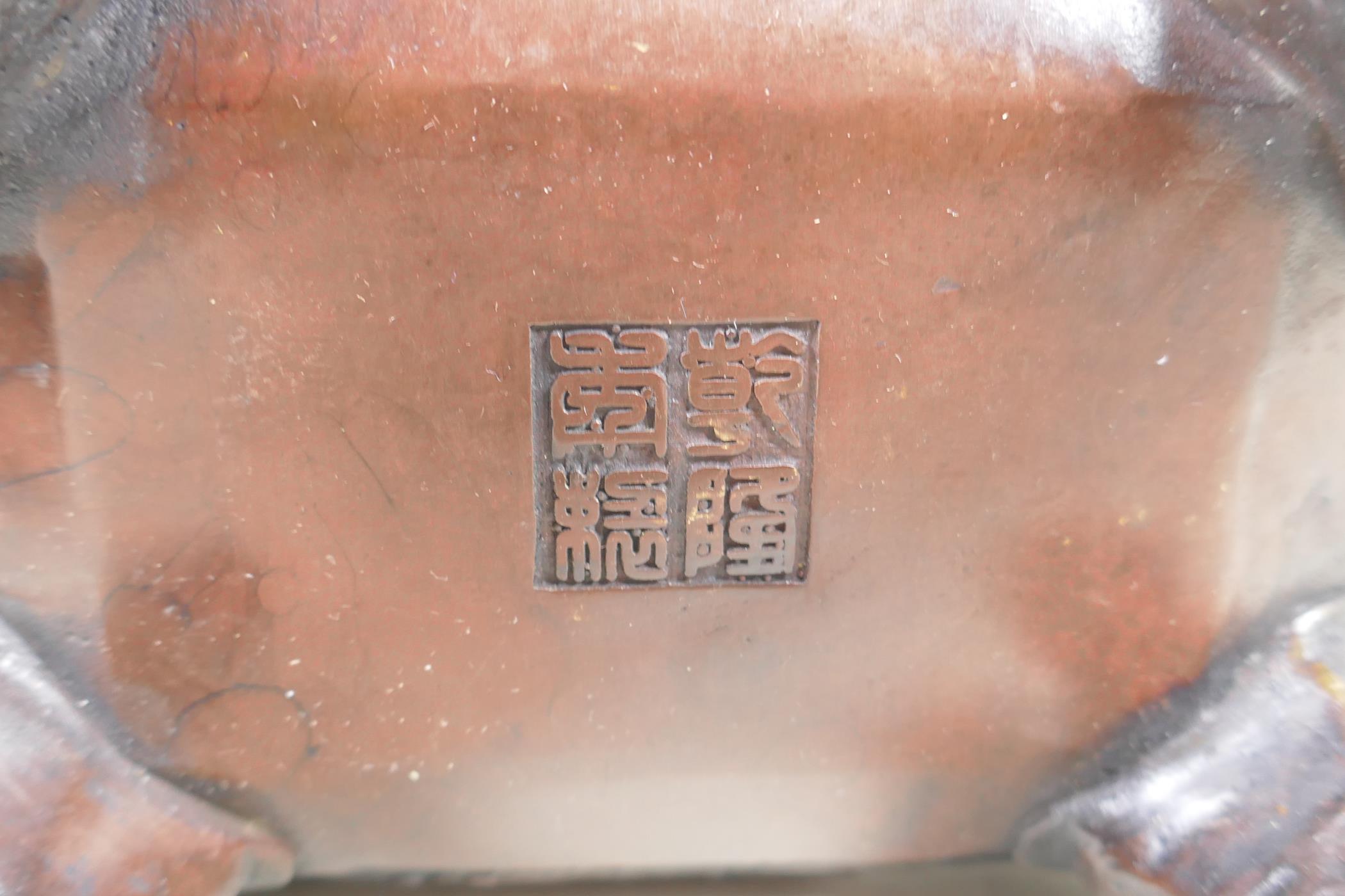A Chinese bronze two handles censer and cover, with allover kylin decoration and lion mask feet, - Image 5 of 5