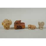 A Japanese carved boxwood rat netsuke, together with two carved tagua nut netsuke in the form of a