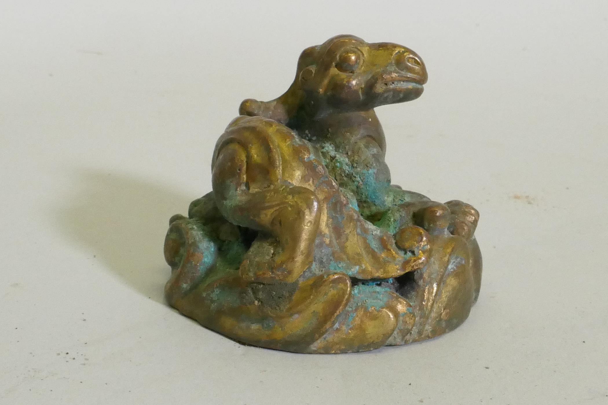 An Eastern bronze figure of a horned dragon, 5cm high - Image 2 of 4