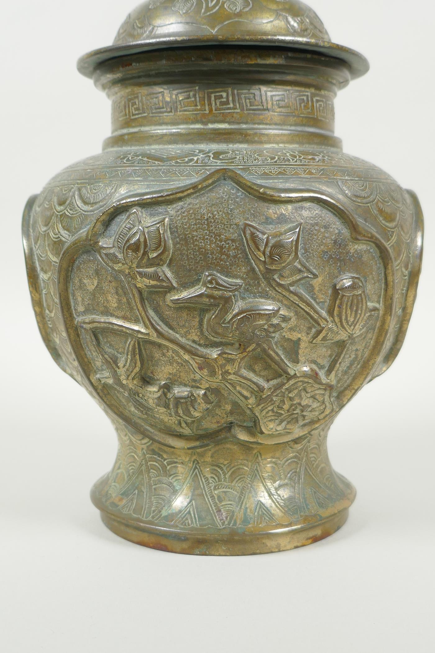 A Chinese gilt bronze meiping jar and cover, with raised decorative panels depicting asiatic animals - Image 2 of 8