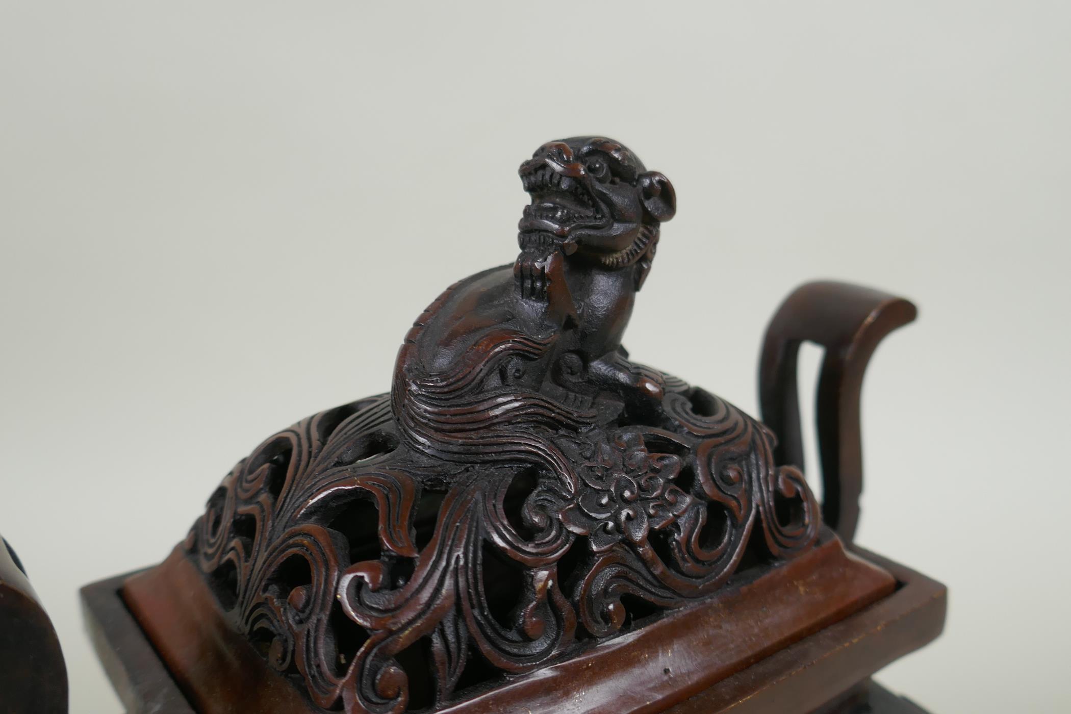 A Chinese bronze two handles censer and cover, with allover kylin decoration and lion mask feet, - Image 3 of 5