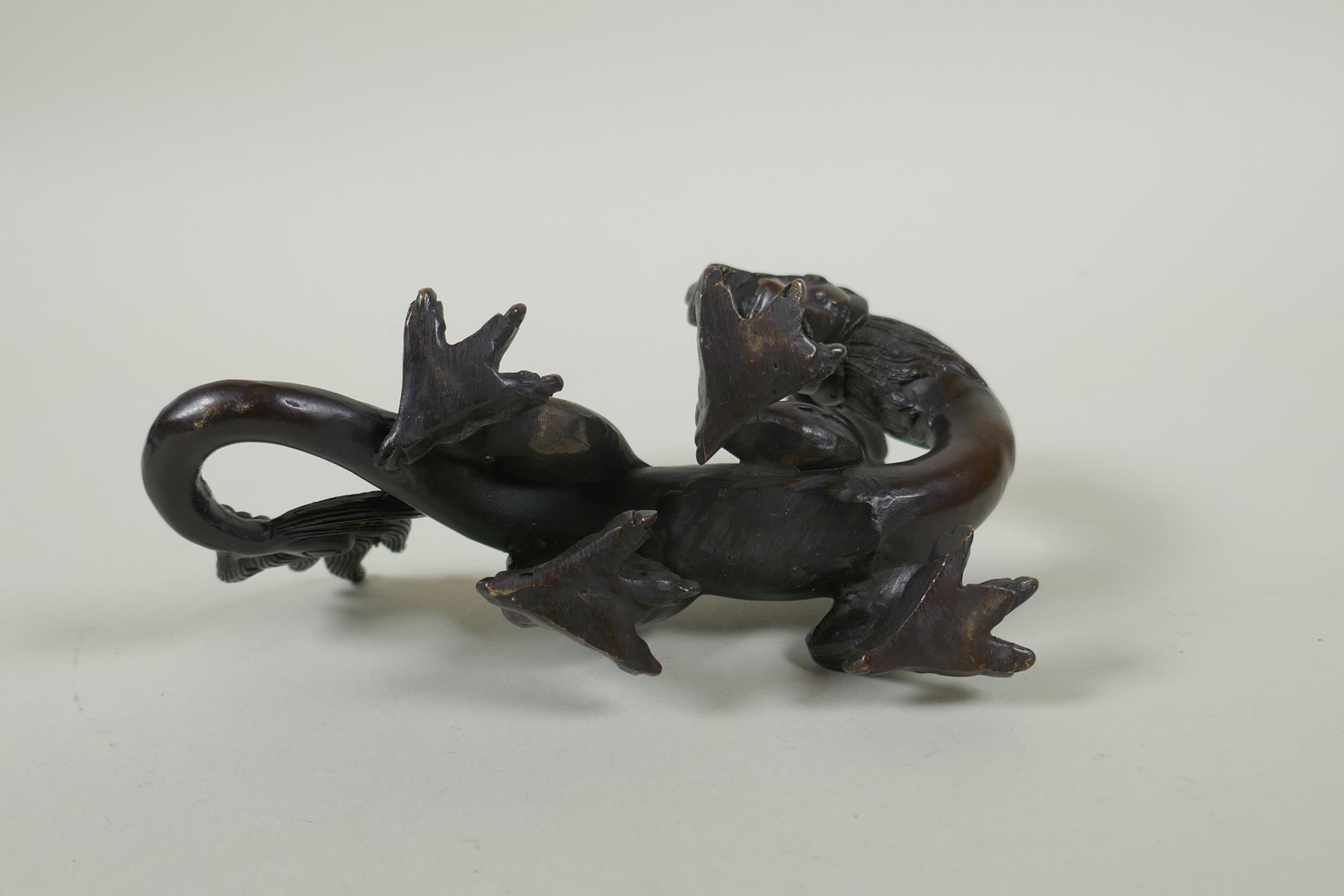 An oriental bronze figure of a dragon, 15cm long - Image 3 of 3