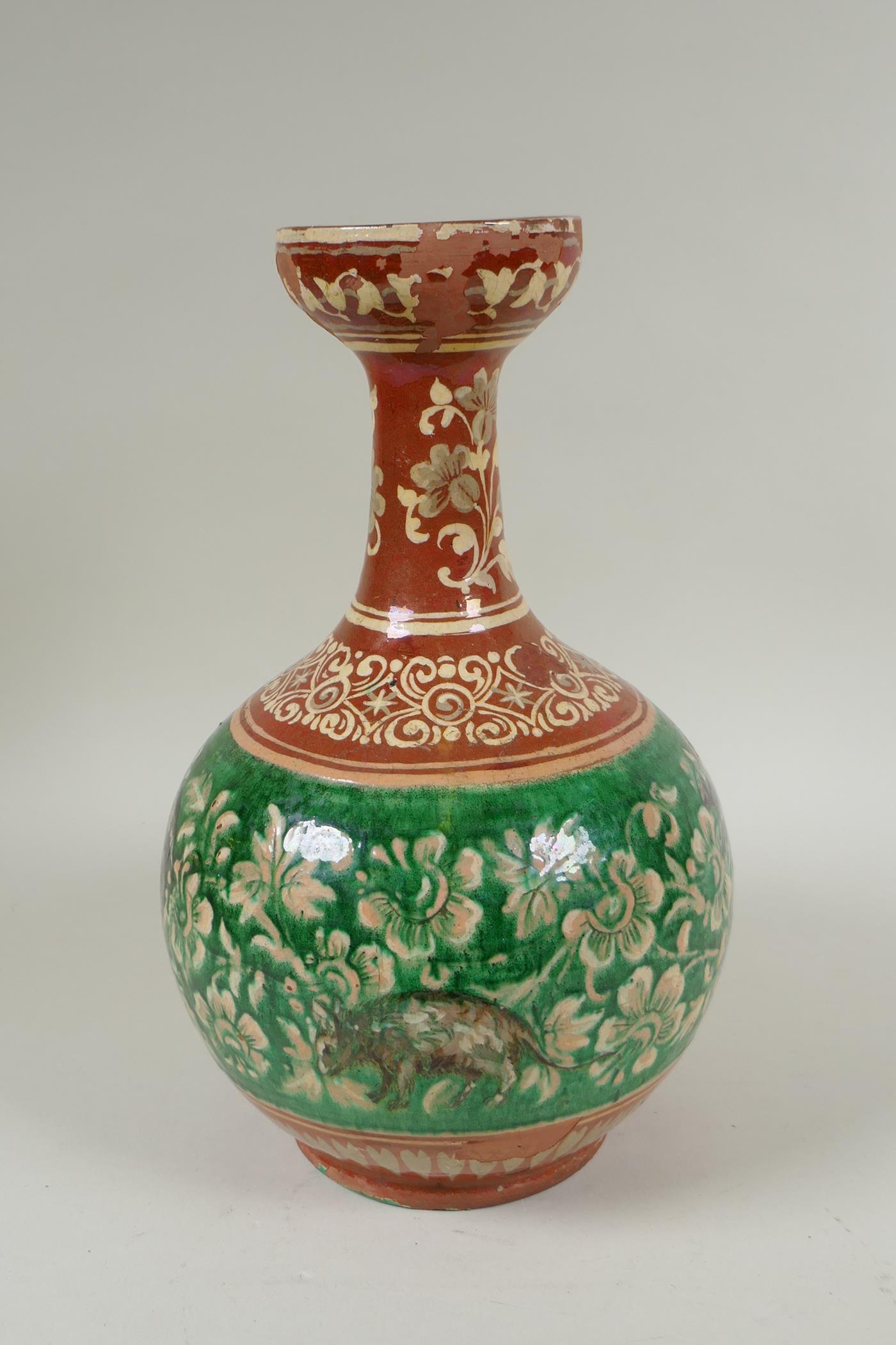 An antique Islamic redware vase decorated with flowers and rodents, chips to glaze, 27cm high - Image 3 of 6