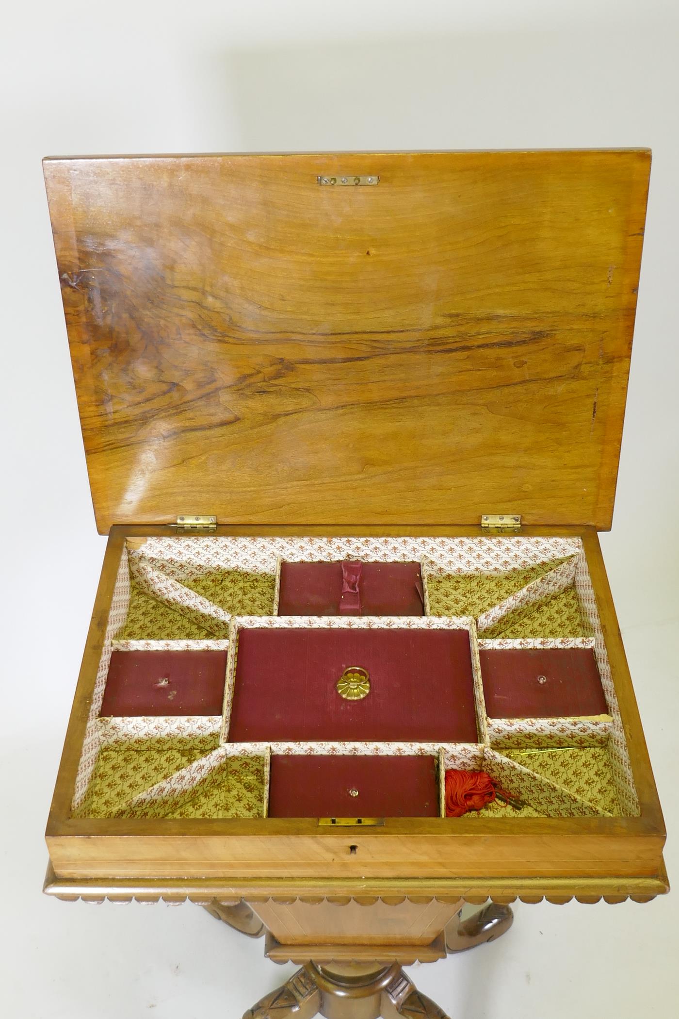 A Victorian inlaid walnut workbox, the rising top revealing a fitted interior, raised on carved - Image 4 of 4