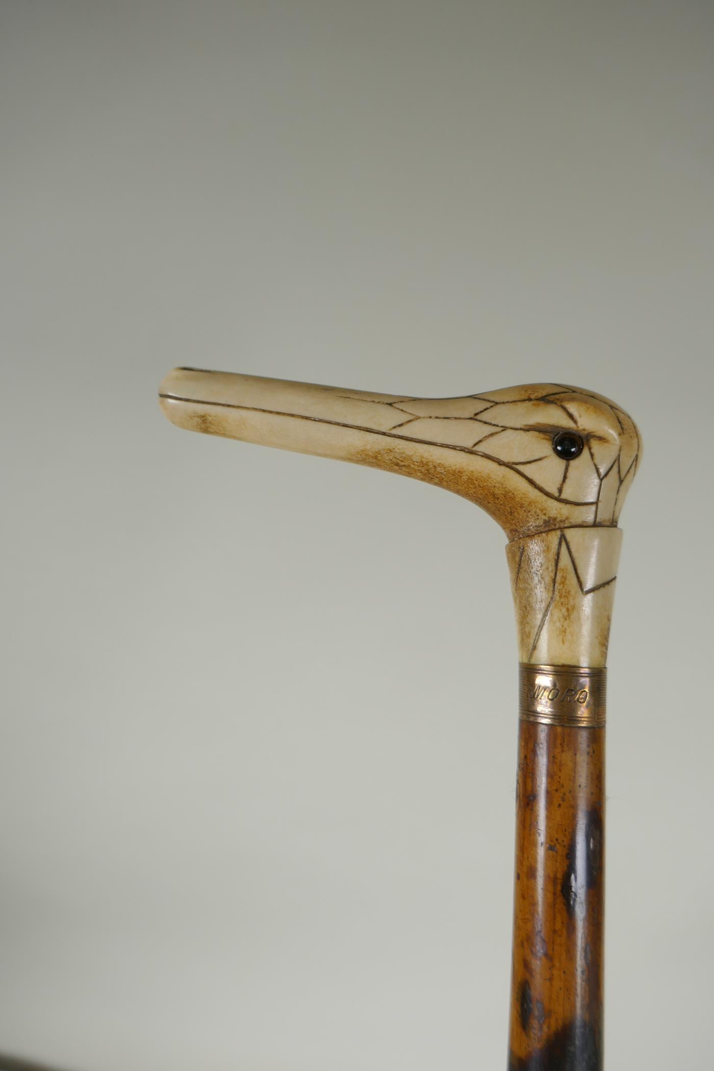 Four antique walking sticks with silver mounts and cuffs, two with carved antler handles, largest - Image 5 of 8