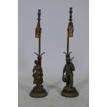 A pair of French gilt bronze, figural gas table lamps, Dutch boy and girl after J. D'Aste, converted