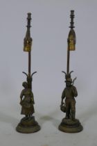 A pair of French gilt bronze, figural gas table lamps, Dutch boy and girl after J. D'Aste, converted