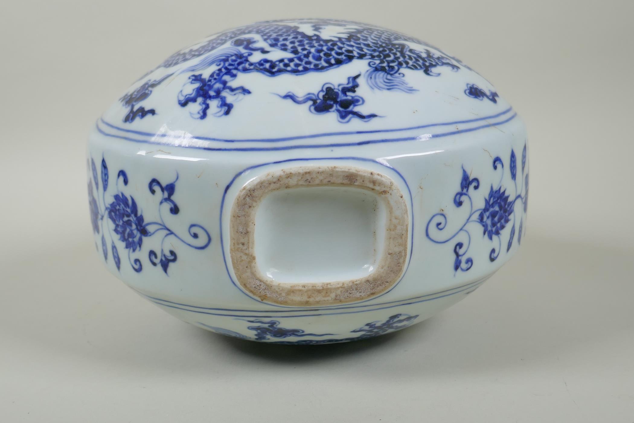 A Chinese blue and white porcelain two handled moon flask decorated with a dragon and flaming pearl, - Image 4 of 5