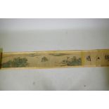 A Chinese printed watercolour scroll depicting an extensive riverside landscape, 29cm high