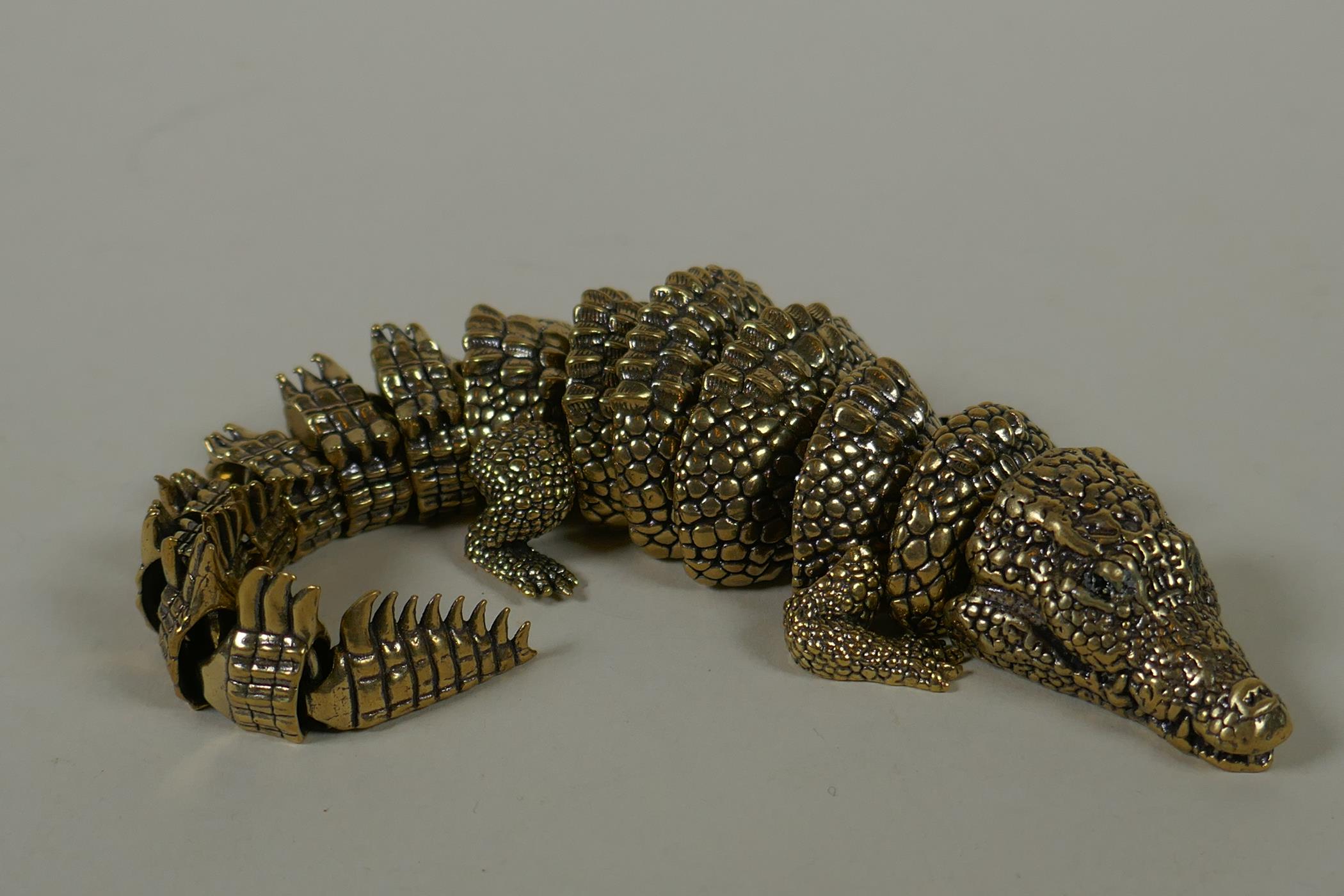 A Japanese Jizai style bronze okimono crocodile with articulated body and legs, 20cm long - Image 3 of 5