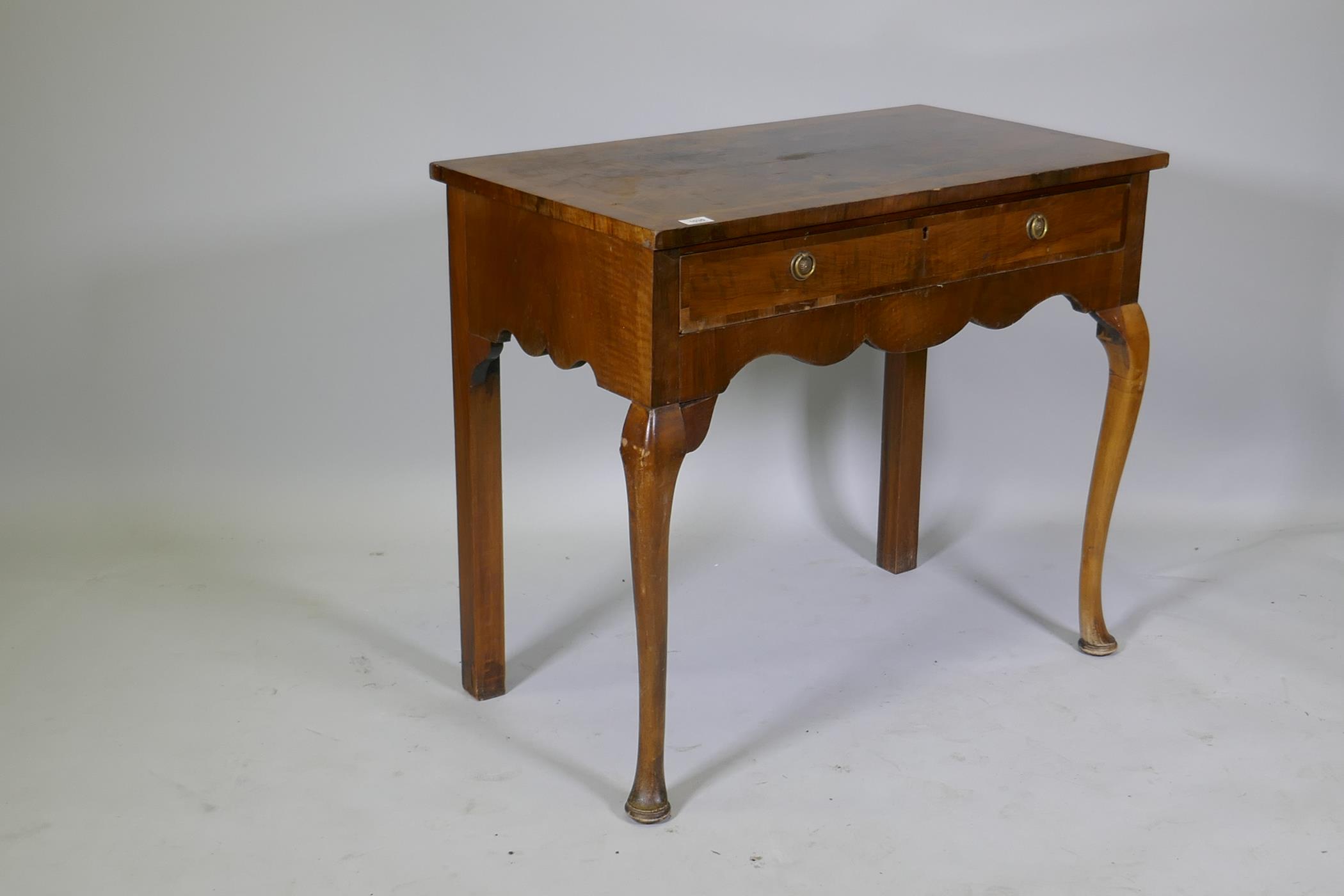 A Georgian style walnut two drawer writing table, with cross banded top, raised on cabriole - Image 3 of 5