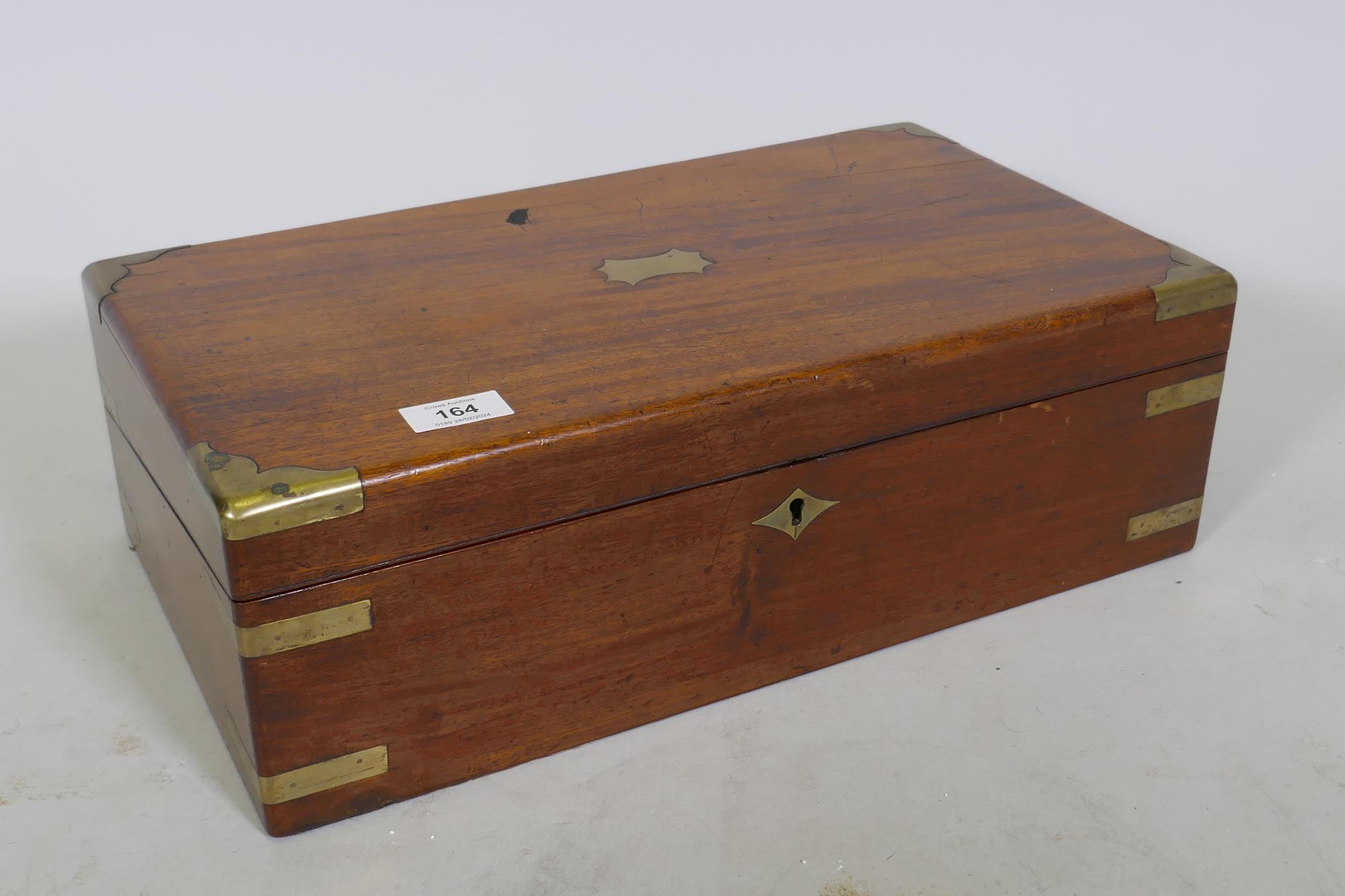 A C19th mahogany writing slope with brass campaign style mounts and inset leather slope, 46 x 26 x