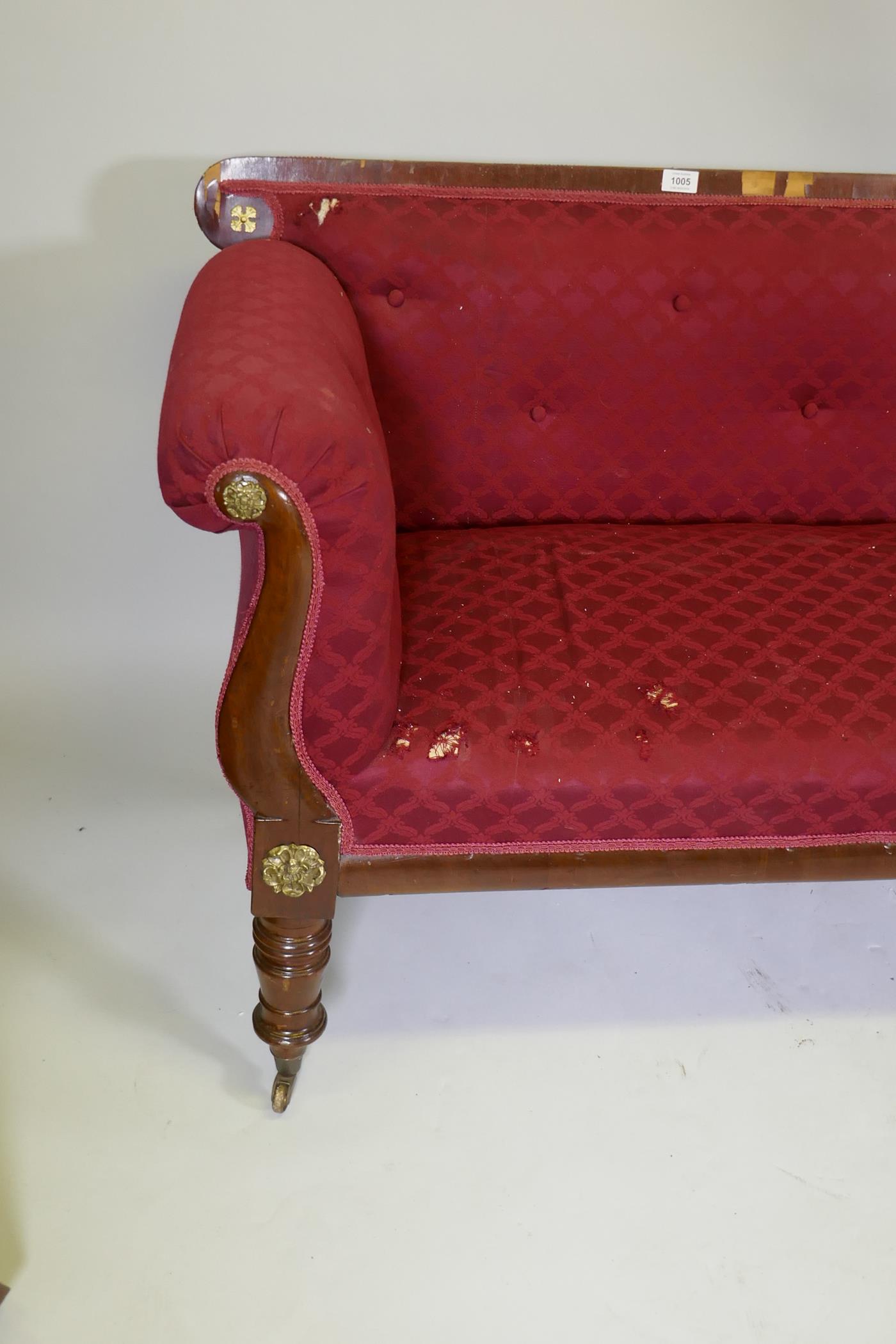 A C19th Continental mahogany settee, with scrolled arms and brass mounts, raised on turned supports, - Image 2 of 2