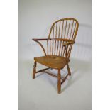 A C19th Windsor hoop back armchair with elm seat, reduced, 86cm high