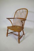 A C19th Windsor hoop back armchair with elm seat, reduced, 86cm high