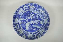 A Chinese C19th Kraak porcelain charger decorated with asiatic birds, 38cm diameter