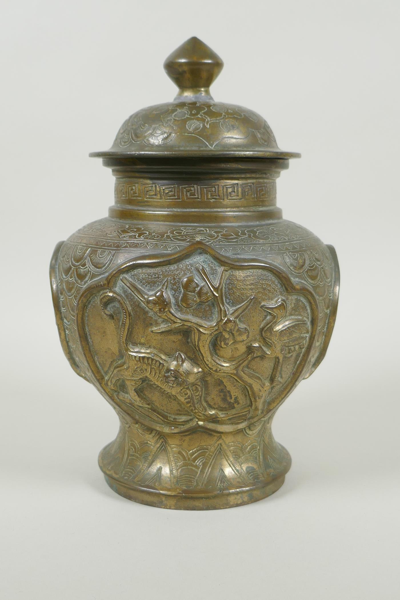 A Chinese gilt bronze meiping jar and cover, with raised decorative panels depicting asiatic animals - Image 4 of 8